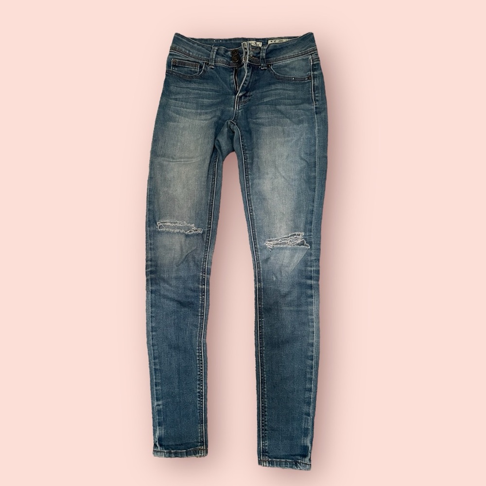 2 for $10! Skinny blue jeans rips above knees